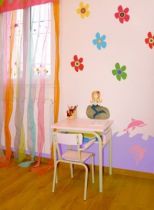 Stickers Petite Sir�ne assise sur son rocher imprim�e sur adh�sif blanc avec d�coupe � la forme.